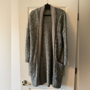 Long sweater size medium.  Cotton and acrylic.